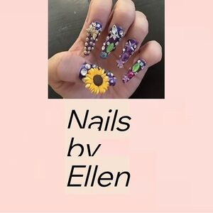 2 sets of nails with rhinestones and gel polish.